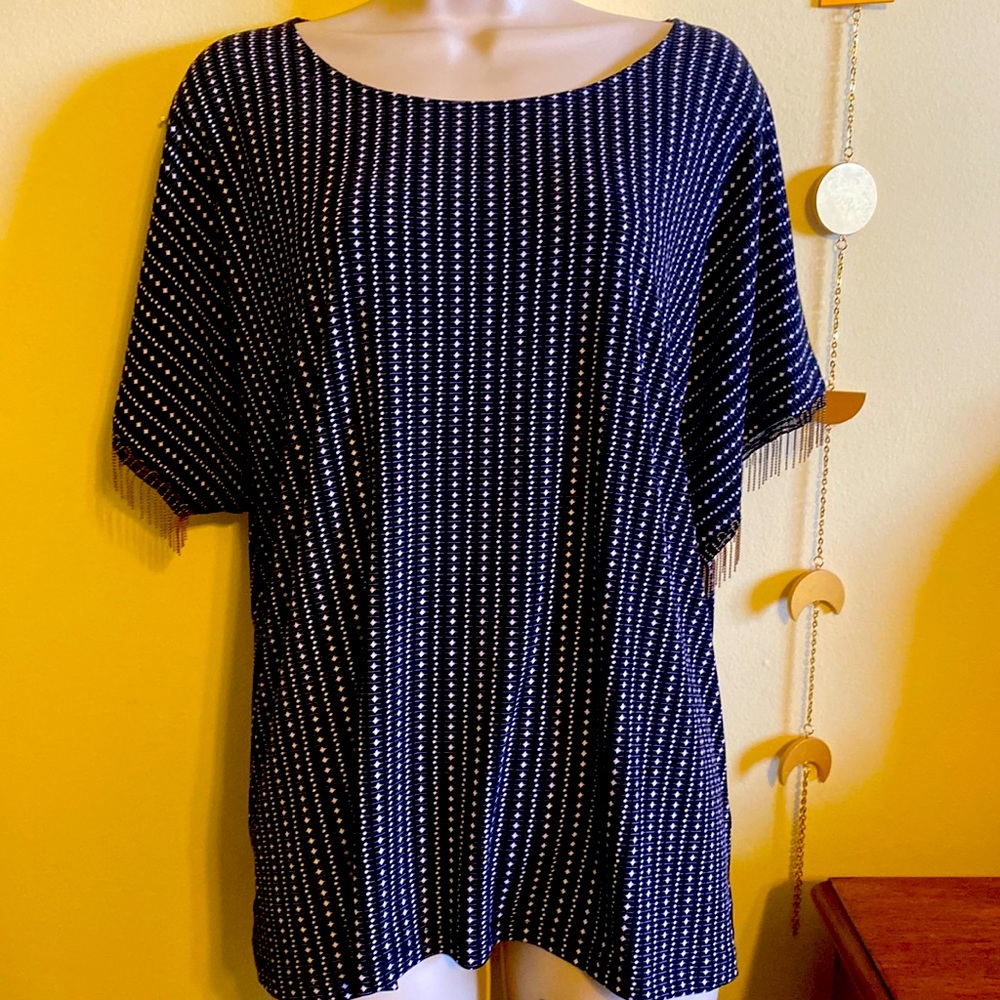 Elegant top with embellished on the sleeves